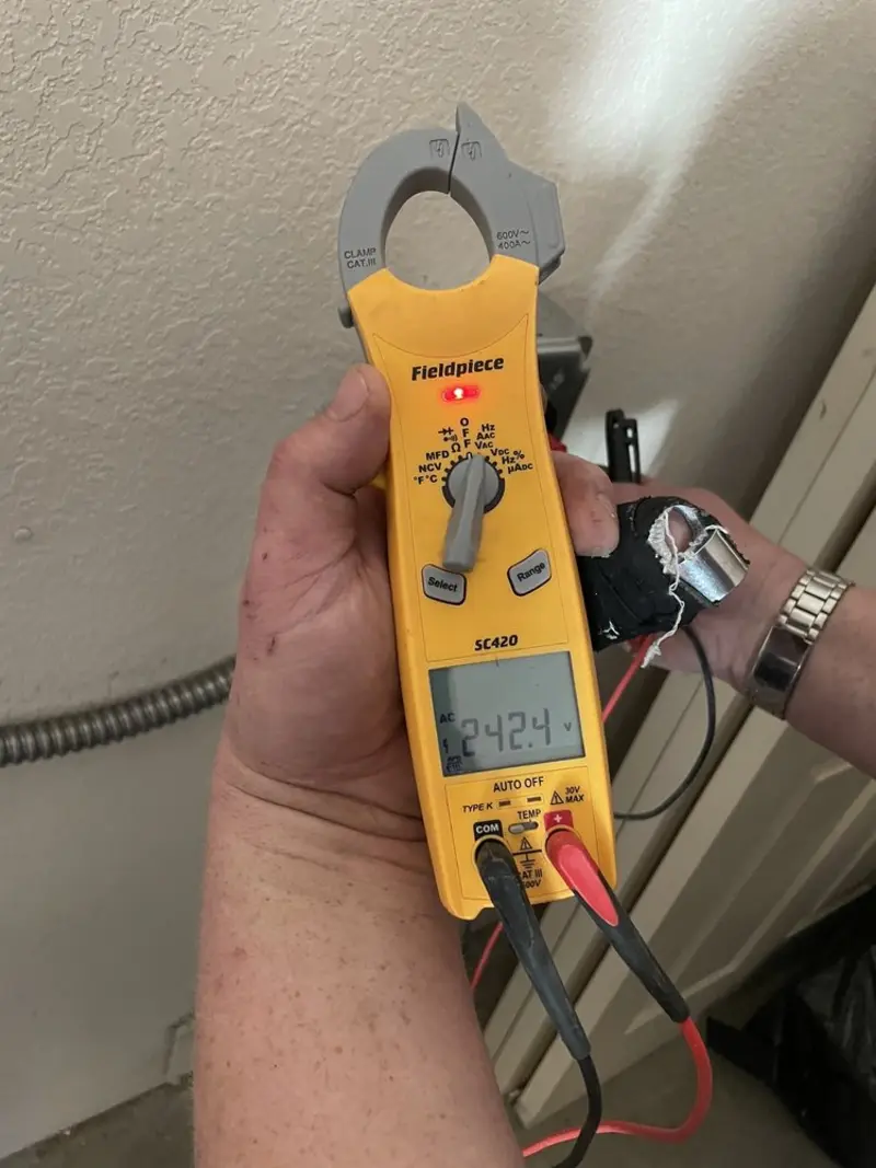 Voltage testing with clamp meter during Electrical Installation Services in Red Bluff